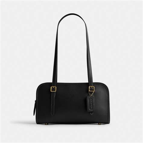 coach swing zip tote.